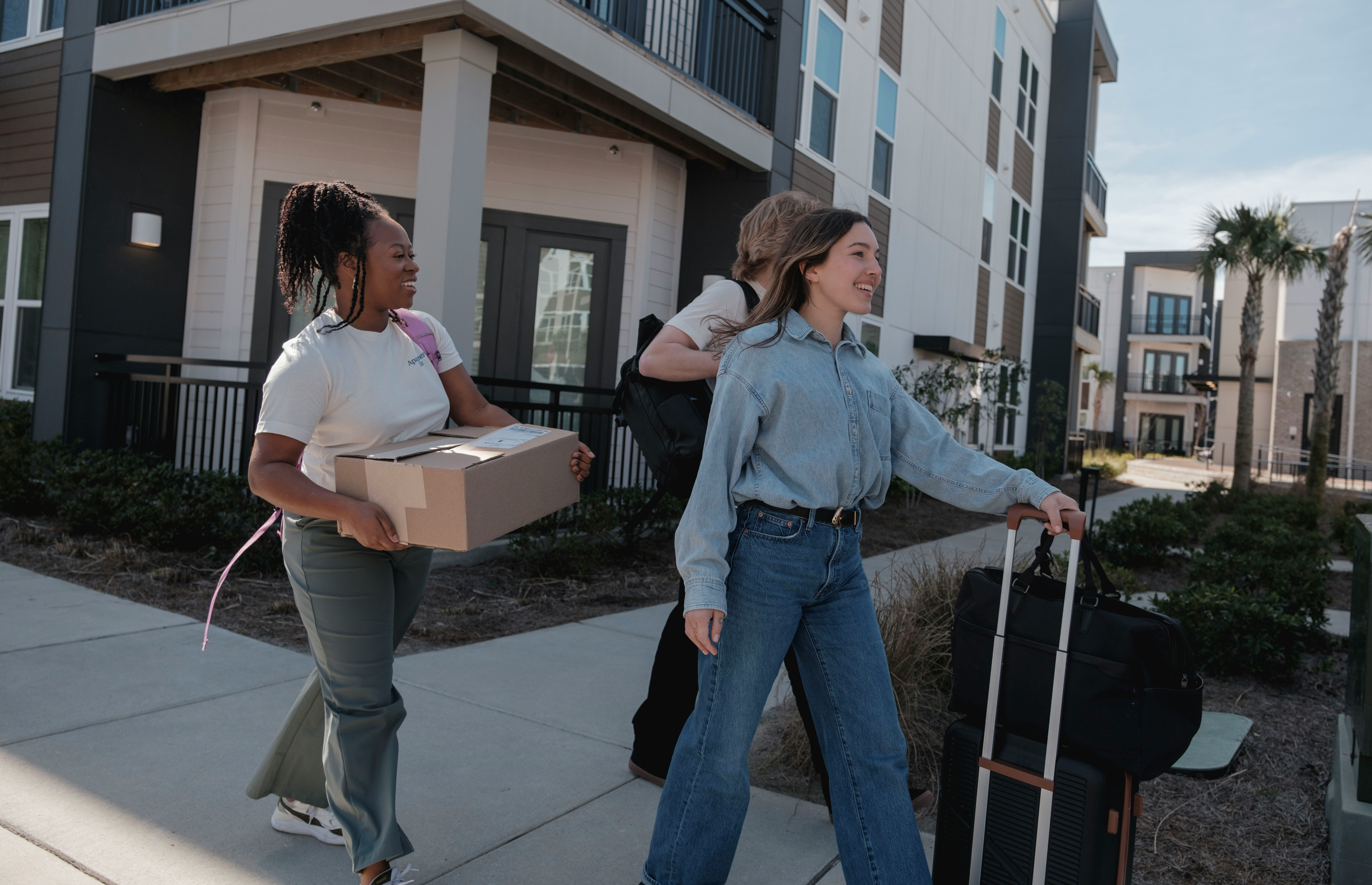 People preparing household items for a new home.